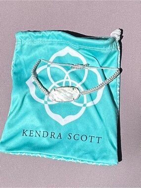 Kendra Scott Silver Macramé Bracelet with Iridescent White Stone and Teal Pouch
